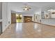 Spacious living room features a cozy brick fireplace and sliding glass doors to the backyard at 18874 E Colorado Dr, Aurora, CO 80017