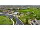 Aerial view of the community with a pool, clubhouse, and manicured green spaces, creating a vibrant neighborhood at 23421 E Rockinghorse Pkwy, Aurora, CO 80016