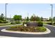 Welcome to the Inspiration Club, featuring well-maintained landscaping at the entrance, creating a welcoming atmosphere at 23421 E Rockinghorse Pkwy, Aurora, CO 80016