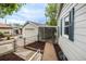 A fenced yard with a detached garage offers privacy and plenty of room for parking and storage at 1809 W Crestline Dr, Littleton, CO 80120