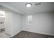 Finished basement featuring a bathroom with a single vanity and tiled shower at 1809 W Crestline Dr, Littleton, CO 80120
