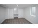Bright bedroom featuring neutral carpet, natural light, and ample closet space, creating a serene and inviting atmosphere at 1809 W Crestline Dr, Littleton, CO 80120