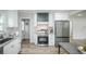 Well-appointed kitchen with modern appliances, sleek cabinets, and convenient layout for cooking at 1809 W Crestline Dr, Littleton, CO 80120