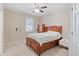 Bright bedroom with natural light, carpet flooring, ceiling fan, and neutral decor at 20145 E Fair Ln, Centennial, CO 80016
