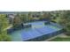 Aerial view of two well-maintained tennis courts, providing a recreational amenity for active residents at 20145 E Fair Ln, Centennial, CO 80016