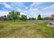 Large backyard offering plenty of space for recreation, relaxation, and entertainment at 9214 Winona Ct, Westminster, CO 80031