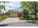 Charming single-story home with a well-manicured lawn and attached garage at 9214 Winona Ct, Westminster, CO 80031