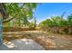 An expansive backyard, partially shaded, is ready for outdoor fun and relaxation at 1401 Ash St, Denver, CO 80220