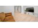 Finished basement featuring a large TV, comfortable seating, and modern decor at 1401 Ash St, Denver, CO 80220