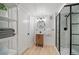 A modern bathroom boasts a sleek vanity and a glass-enclosed shower at 1401 Ash St, Denver, CO 80220