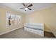 Cozy bedroom features a built-in bed, carpet and a light-filled window at 1401 Ash St, Denver, CO 80220