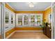 Bright bonus room featuring large windows allowing for natural light and hardwood floors at 1401 Ash St, Denver, CO 80220