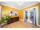Bright dining room with hardwood floors, stylish furniture, and an inviting ambiance at 1401 Ash St, Denver, CO 80220