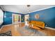 Inviting living room with wood floors and modern decor; great light! at 1401 Ash St, Denver, CO 80220