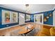 Stylish living room with wood floors, modern lighting, and a welcoming atmosphere at 1401 Ash St, Denver, CO 80220