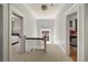 Bright hallway with views into bedrooms on either side at 1265 Saint Paul St, Denver, CO 80206