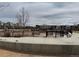 Community dog park offering a fenced in space for dog play at 480 E Fremont Pl # 308, Centennial, CO 80122