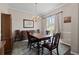 Elegant dining room with a classic chandelier and formal dining set at 329 Bobcat Pt, Lafayette, CO 80026