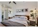 Comfortable bedroom with a plush bed, stylish decor, and natural light at 4100 Albion St # 221, Denver, CO 80216
