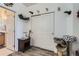 Entryway boasts closet, cat tree and feeder station, plus easy access to a nearby bathroom at 4100 Albion St # 221, Denver, CO 80216