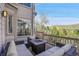 Spacious outdoor deck with cozy seating and a fire pit, perfect for entertaining at 165 Washington St, Golden, CO 80403
