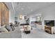 Basement living area featuring neutral carpet, recessed lighting, and built-in benches at 165 Washington St, Golden, CO 80403