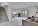 Spacious finished basement features neutral carpet, recessed lighting, and a sliding glass door at 165 Washington St, Golden, CO 80403