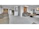 A spacious finished basement with neutral carpet, recessed lighting and two sofas at 165 Washington St, Golden, CO 80403