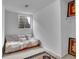 Basement bedroom with egress window and neutral walls at 165 Washington St, Golden, CO 80403