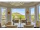Elegant dining area boasts natural light and picturesque mountain vistas at 165 Washington St, Golden, CO 80403