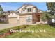 Two-story home with a two-car garage, lush lawn, and an open house on Saturday from 11 to 1 at 165 Washington St, Golden, CO 80403