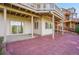 Walk-out basement patio with brick pavers, siding and structural supports at 165 Washington St, Golden, CO 80403