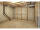 Unfinished basement with exposed ceiling, plumbing, and concrete walls, a blank canvas for finishing at 11884 Elk Head Range Rd, Littleton, CO 80127