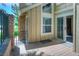 Inviting deck with sliding glass doors and brick accents provides a seamless transition to indoor-outdoor living at 11884 Elk Head Range Rd, Littleton, CO 80127