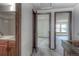 Hallway featuring multiple doorways at 11884 Elk Head Range Rd, Littleton, CO 80127