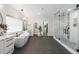 Spacious bathroom with soaking tub, walk-in shower, and dual vanities at 27250 E Nova Cir, Aurora, CO 80016