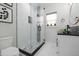 Modern bathroom featuring a glass-enclosed shower and stylish vanity at 27250 E Nova Cir, Aurora, CO 80016