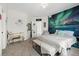 Bright bedroom featuring a statement wall with a Northern Lights mural and a stylish vanity at 27250 E Nova Cir, Aurora, CO 80016