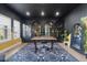 Contemporary home office with a unique desk, stylish decor, and ample natural light at 27250 E Nova Cir, Aurora, CO 80016