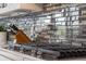 Close up of modern kitchen with sleek cooktop and decorative backsplash at 27250 E Nova Cir, Aurora, CO 80016