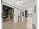 Open floorplan showcasing the flow between the office, entryway, and other living spaces at 27250 E Nova Cir, Aurora, CO 80016