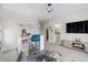 Another view of playroom with art station and a glimpse into the en-suite bathroom at 27250 E Nova Cir, Aurora, CO 80016