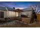 Inviting backyard deck with pergola and outdoor dining set, ideal for outdoor gatherings at 1190 Glencoe St, Denver, CO 80220