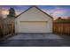 Spacious detached garage with ample storage, plus fenced yard at 1190 Glencoe St, Denver, CO 80220