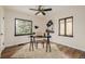 Inviting home office with natural light, modern decor, and hardwood floors, perfect for remote work at 1190 Glencoe St, Denver, CO 80220