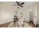 Office area featuring a ceiling fan, a desk with a chair, and carpet, suitable for work or study at 1190 Glencoe St, Denver, CO 80220