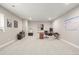Finished basement office space with neutral carpet, desk, wall decorations, and bright lighting at 2766 Keepsake Way, Castle Rock, CO 80109