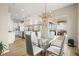 Open dining area next to the kitchen and living room provides an inviting space for meals and gatherings at 2766 Keepsake Way, Castle Rock, CO 80109