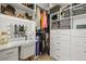 Spacious closet with custom shelving, storage drawers, a vanity, and a dressing area, offering organized storage at 2766 Keepsake Way, Castle Rock, CO 80109