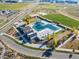 Aerial view of the neighborhood water park with slides, splash pad, and grassy areas at 6045 N Dayton St, Denver, CO 80238